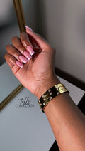 tells signature bangle