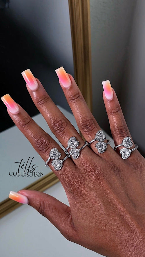 Adjustable double heart ring